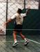 Seba golpeando un smash
